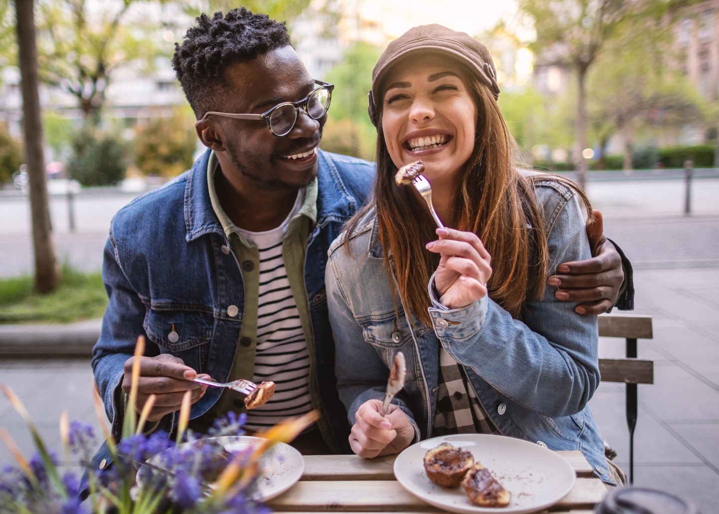 Young couple dining outdoors