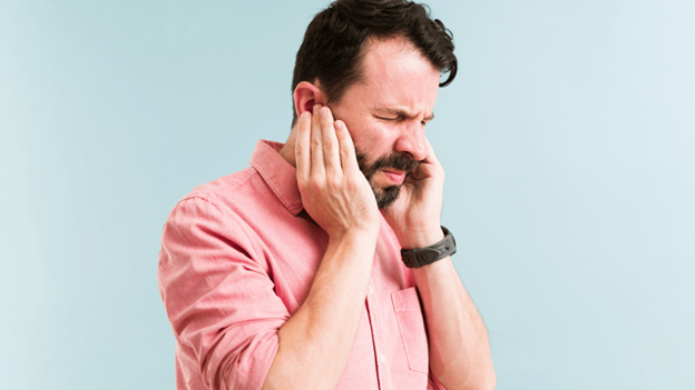 Man experiencing ringing in the ears